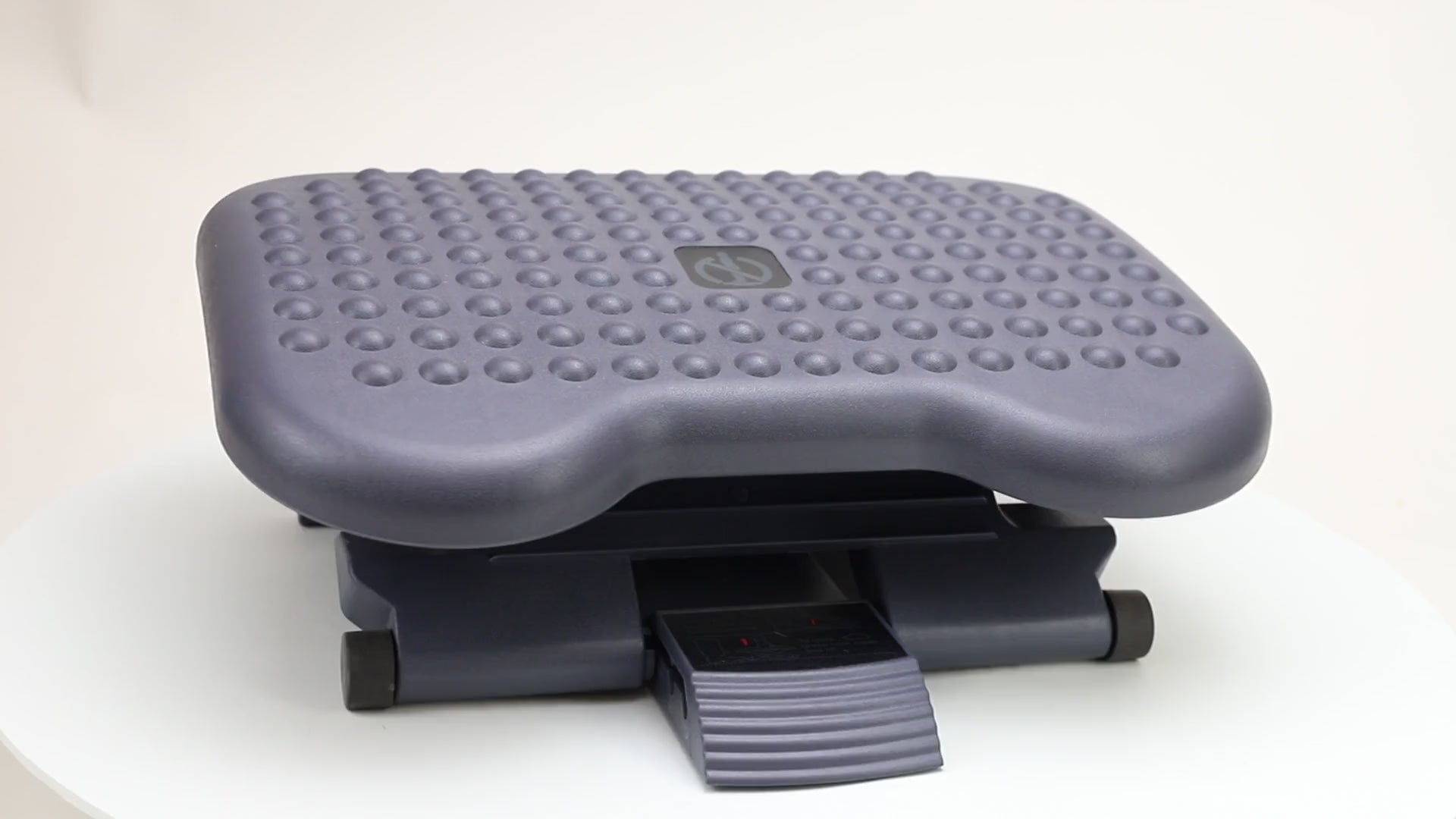 Slip this mat under your desk and get a foot massage while you work